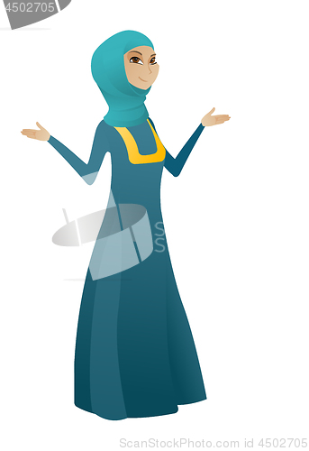 Image of Muslim confused business woman with spread arms.