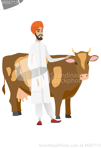 Image of Farmer standing with crossed arms near cow.