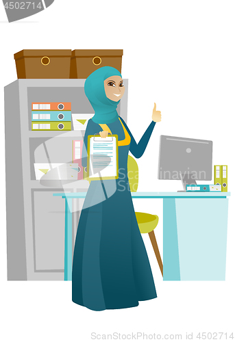 Image of Business woman with clipboard giving thumb up.