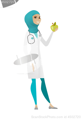 Image of Nutritionist offering fresh red apple.