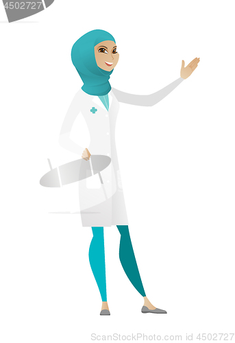 Image of Muslim doctor showing a direction.