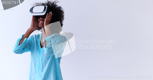 Image of black girl using VR headset glasses of virtual reality