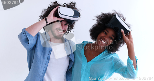Image of multiethnic couple getting experience using VR headset glasses