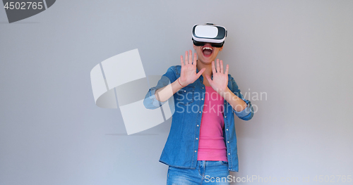 Image of girl using VR headset glasses of virtual reality