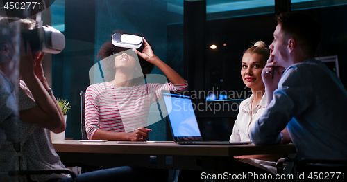 Image of Multiethnic Business team using virtual reality headset