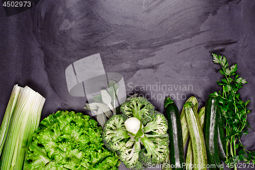 Image of Variety of green vegetables and herbs.