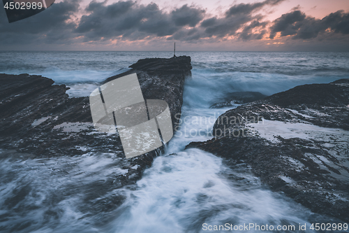 Image of Dawn Skies, Moody Seas and Rocky Chasms Landscapes