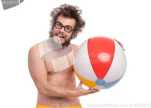 Image of Crazy bearded man - beach concept