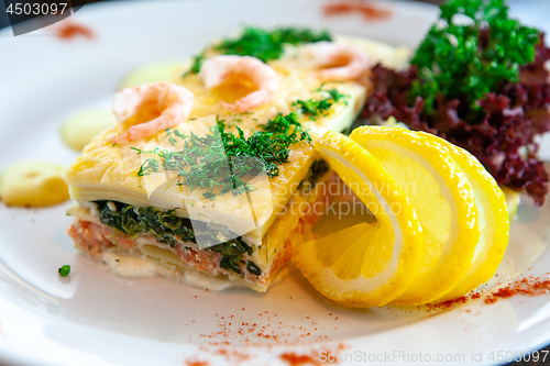 Image of Casserole with shrimps, greens and lemon