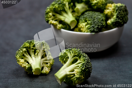 Image of Fresh green organic broccoli in white bowl