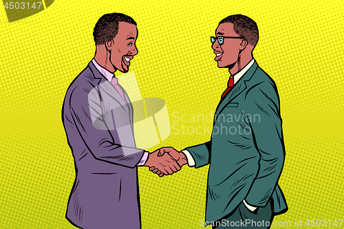 Image of african businessmen men handshake