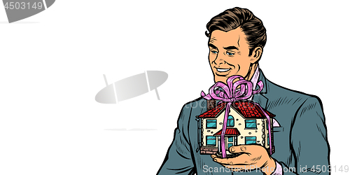 Image of Businessman selling real estate, house as a gift isolate on white background