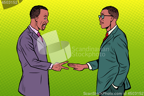 Image of african businessmen game rock paper scissors