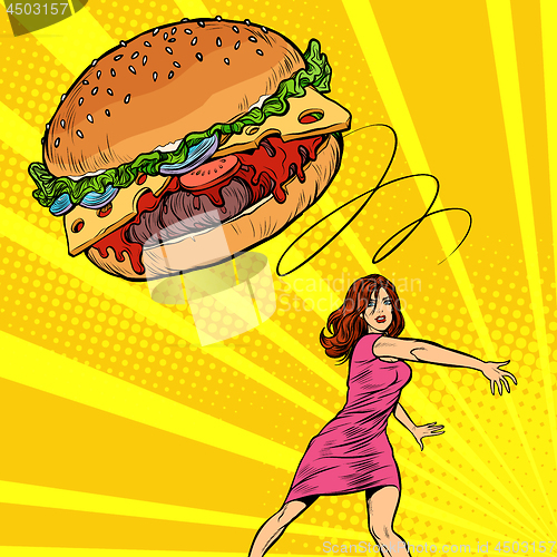 Image of Woman throws Burger, fast food. Diet and healthy eating