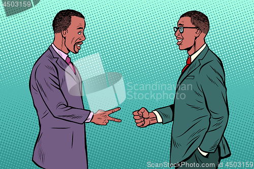 Image of african businessmen game rock paper scissors