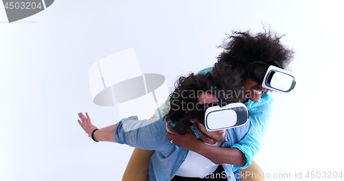 Image of multiethnic couple getting experience using VR headset glasses