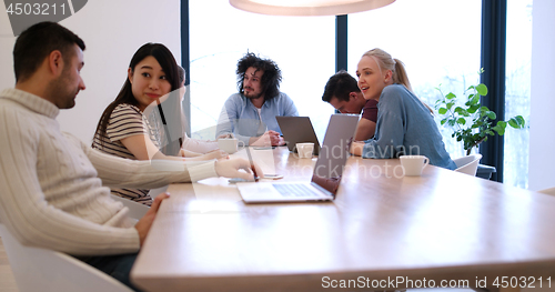 Image of Startup Business Team At A Meeting at modern office building