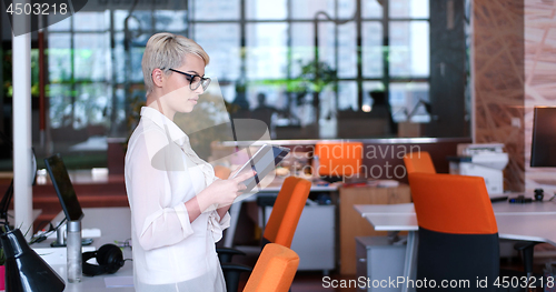 Image of Businesswoman using tablet