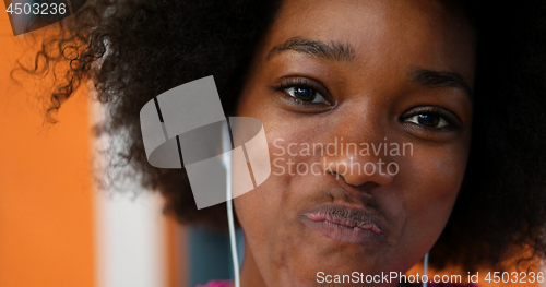 Image of portrait of young afro american woman in gym