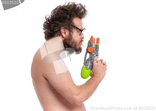 Image of Crazy bearded man - beach concept