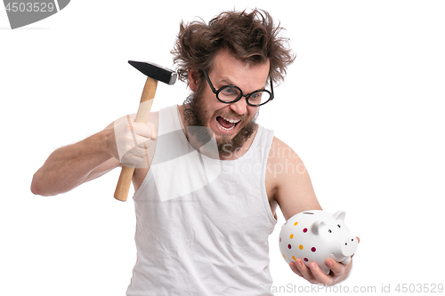 Image of Crazy bearded man with piggy bank