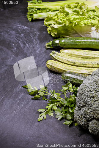 Image of Variety of green vegetables and herbs.