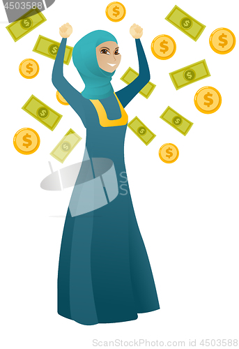 Image of Happy busiess woman under money rain.