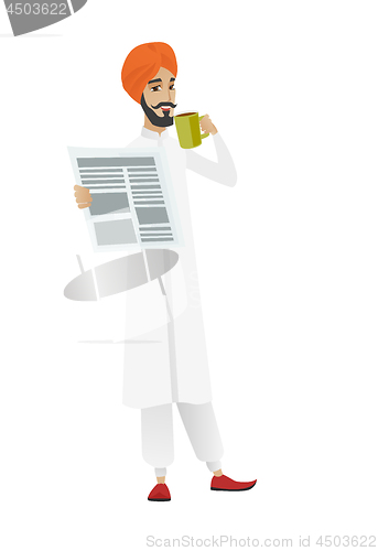 Image of Businessman drinking coffee and reading newspaper.