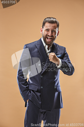 Image of Winning success man happy ecstatic celebrating being a winner. Dynamic energetic image of male model