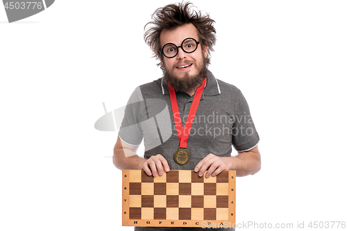 Image of Crazy bearded man with Chess board