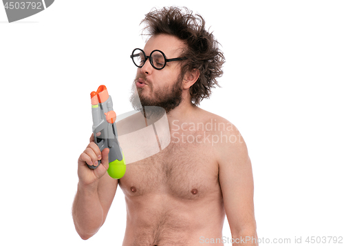 Image of Crazy bearded man - beach concept