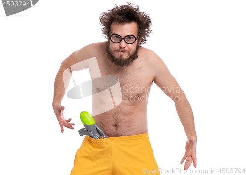 Image of Crazy bearded man - beach concept