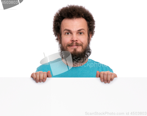 Image of Crazy man with blank signboard