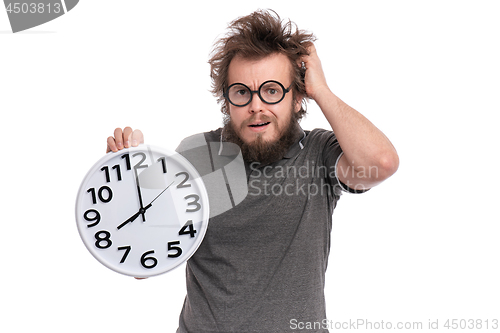 Image of Crazy bearded man with big clock