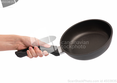 Image of Hand with frying pan