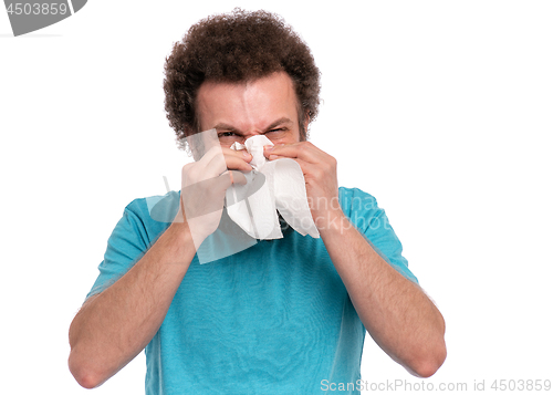 Image of Crazy bearded man has runny nose