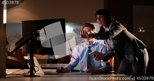 Image of young designers in the night office