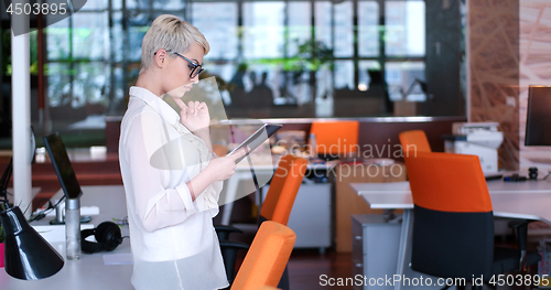 Image of Businesswoman using tablet