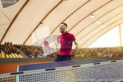 Image of The table tennis player celebrating victory