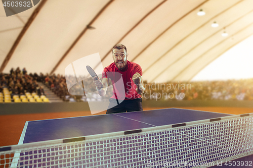 Image of The table tennis player celebrating victory