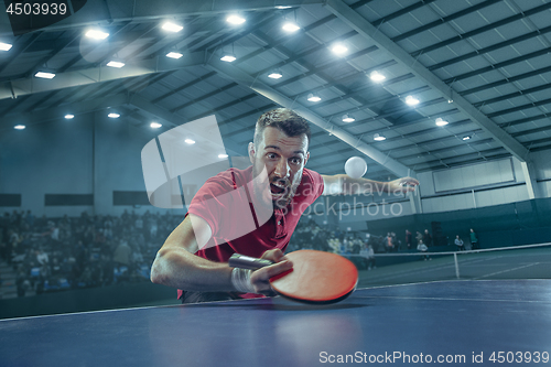 Image of The table tennis player serving