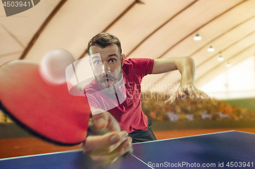 Image of The table tennis player serving