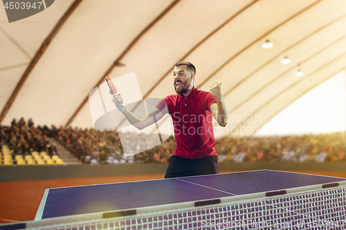 Image of The table tennis player celebrating victory