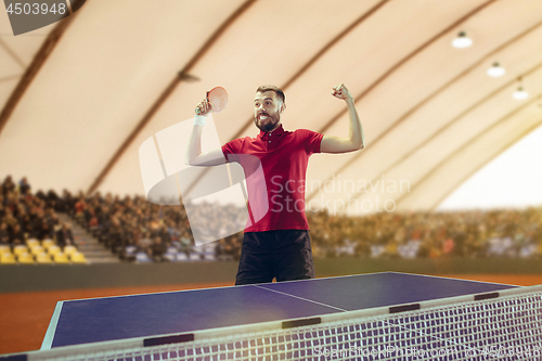 Image of The table tennis player celebrating victory