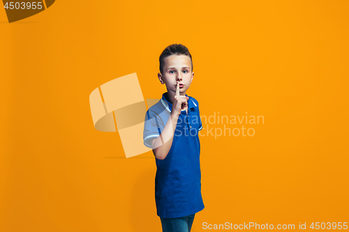 Image of Young serious thoughtful teen boy. Doubt concept.