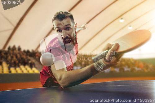 Image of The table tennis player serving