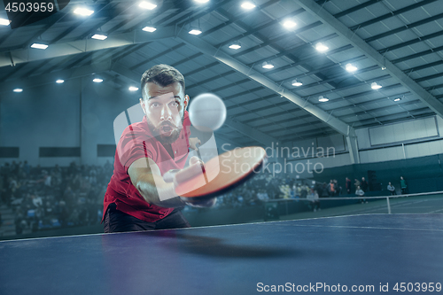 Image of The table tennis player serving