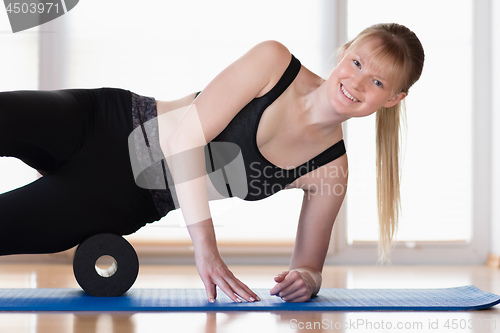 Image of Girl with fascia roll