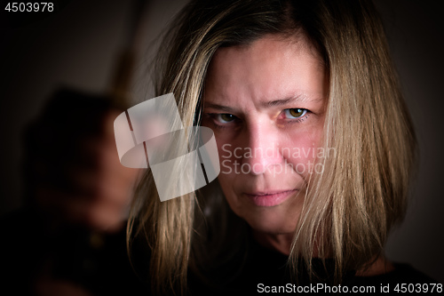 Image of Female fighter with sword