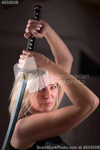 Image of Female fighter with sword